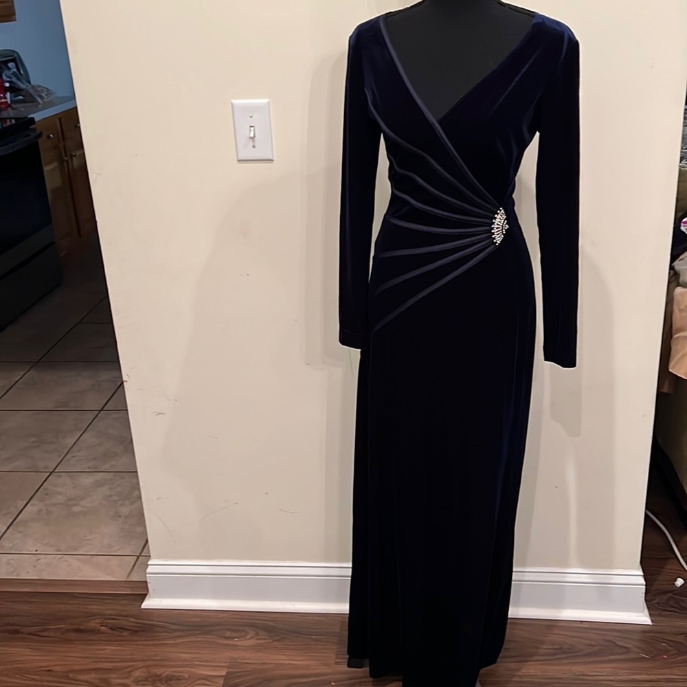 Velvet navy ladies formal with rhinestone broach on the side